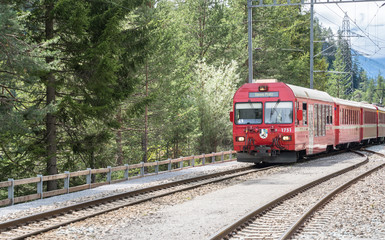 Naklejka premium Regional train comes to the station, Switzerland