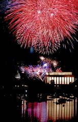 Washington, DC. USA, July 4, 1991  Annual July 4th fireworks display over the Lincoln Memorial as seen from the Virginia side of the Potomac River.