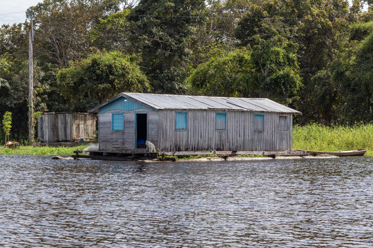 floating house in the amazon river