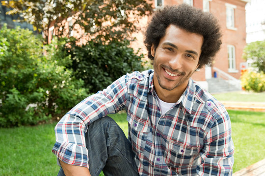 Portrait of young man at college campus.