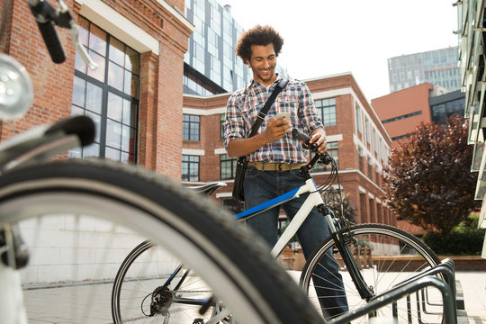 Young man text messaging on mobile.