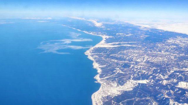 The passenger's view through the plane window during the flight.