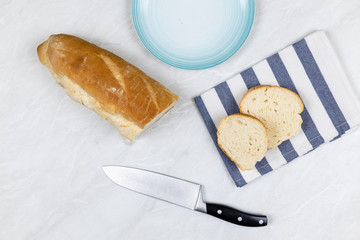 Flatlay above grey marble table with smoked ham sandwiches breakfast