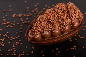 Chocolate egg with filling of brigadeiro for Easter