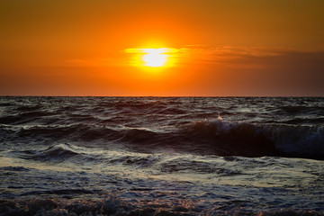 Sea waves and Beautiful dawn sunrise at sea. Seascape.