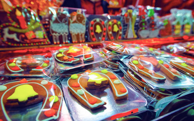 Typical Christmas stand with gingerbread cookies reflex