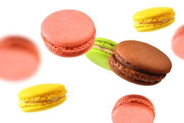 Fresh levitation fall sweet eat french macaroons on white background