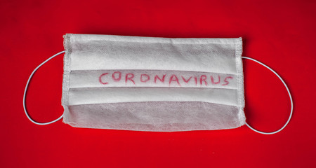 bandage against coronavirus on  red  background .COVID-2019