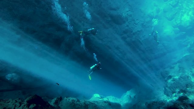 Divers in crystalline waters in Bonito in the state of Mato Grosso do Sul