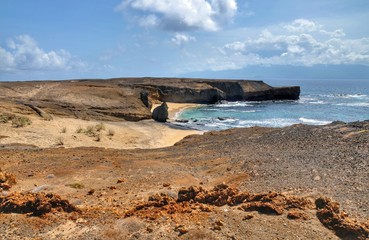 White sand beach under the cliff in Ilheu dos Rombos, Cabo Verde