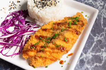 milanesa con arroz