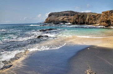 White and black sand beach in one, on the islet of Djeu, Cabo Verde