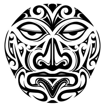 Polynesian style mask tattoo