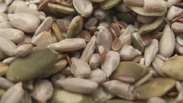 Close up of a peeled seeds. Sunflower and pumpkin seeds