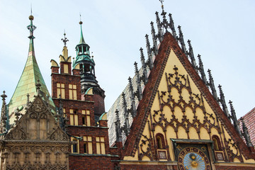 Town Hall of Wroclaw, Poland. Roof, top of the building, tower and astronomical clock.