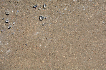 broken glass fragments on asphalt. Background