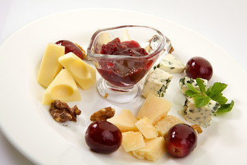 Assortment of cheese isolated on white background