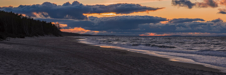 dramatic sky after sunset at sea