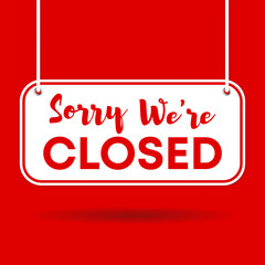Sorry we're closed door sign isolated on red background with shadow
