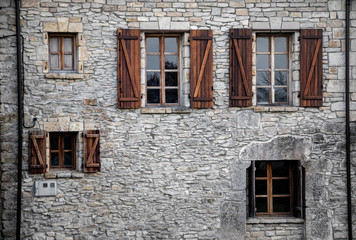 Fototapeta na wymiar window with shutters in old house