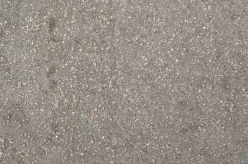 Abstract yellow paved road background. Asphalt, cement, stone, concrete texture.