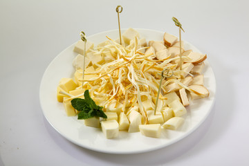 Assortment of cheese isolated on white background. Beer cheese plate