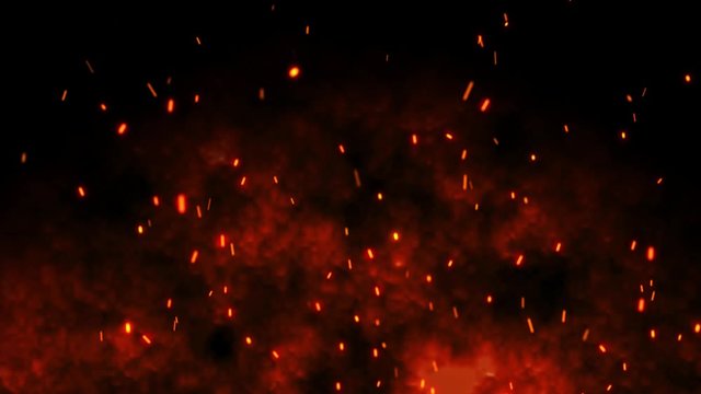 Burning red hot sparks rise from large fire in the night sky. Beautiful abstract background on the theme of fire, light and life. Particles over black background. Flying Embers from fire