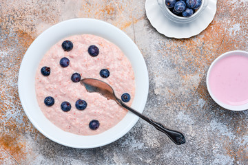 Top view of oatmeal with homemade blueberry yogurt