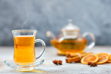 Hot citrus tea with cinnamon and anise