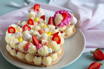 Bunny shaped tart for Easter with fresh strawberry