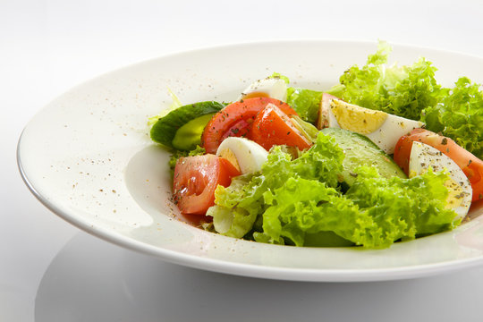Appetizing salad isolated on white background