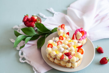 Bunny shaped tart for Easter with fresh strawberry