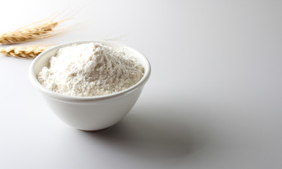 flour glass ears spikelets on a light background