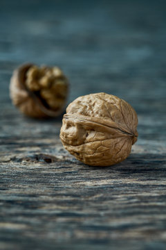 Unpeeled walnut on the table