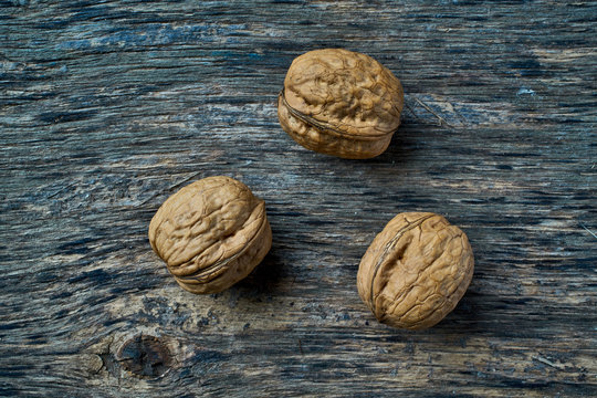 Unpeeled walnuts on the table