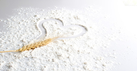 flour heart spikelets on a light background