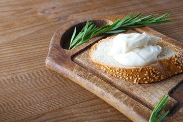 processed cheese bread on a wooden background