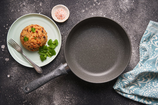 Tasty cutlets in pan and plate