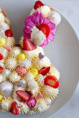 Bunny shaped tart for Easter with fresh strawberry