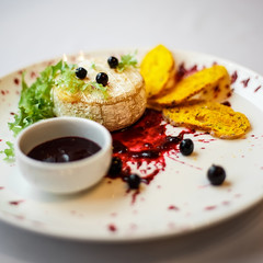 backed cheese with souce