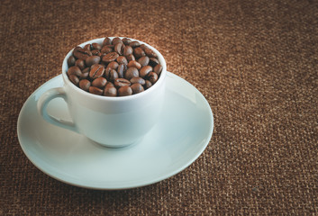 the Cup is filled with coffee beans