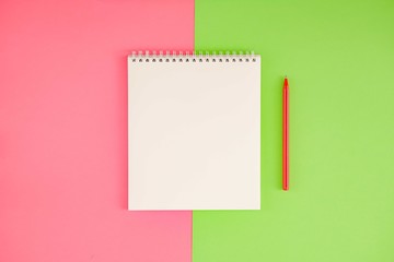 Blank notepad on bright background.