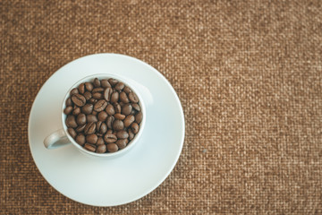 the Cup is filled with coffee beans