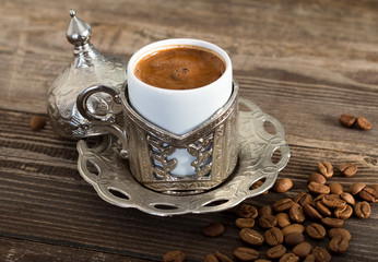 Turkish coffee with delight and traditional copper serving set