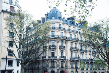 Fototapeta premium houses on french streets of Paris. citylife concept, black balcony lace