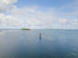 Aerial of smaller tropical islands near the coast of Siargao
