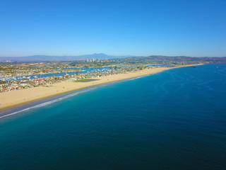 aerial shot of a gorgeous summer landscape along the coastline at Newport Beach Municipal Beach,...