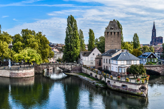 View on the towers and water channels in the historical city center of Strassbourg, France