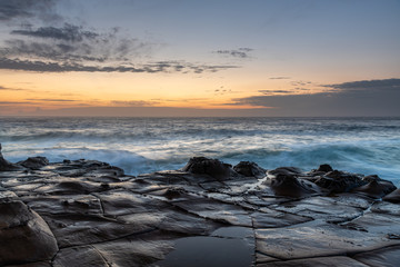 Naklejka premium Coastal Sunrise Seascape from Rock Platform