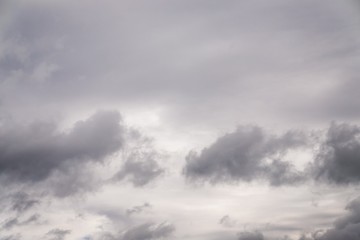 Obraz premium Dramatic gray clouds in the sky. Beautiful gray and white cloudy sky